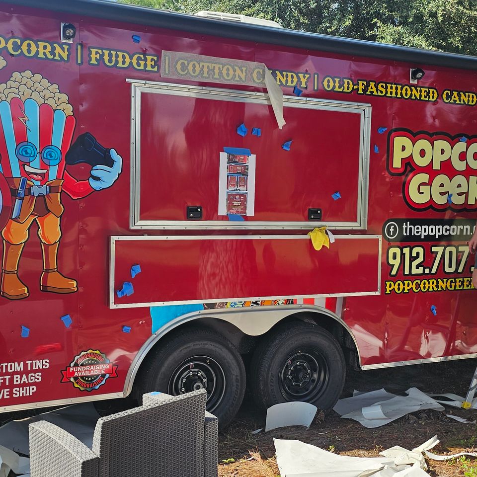 Colorful Popcorn Geeks concession trailer wrap