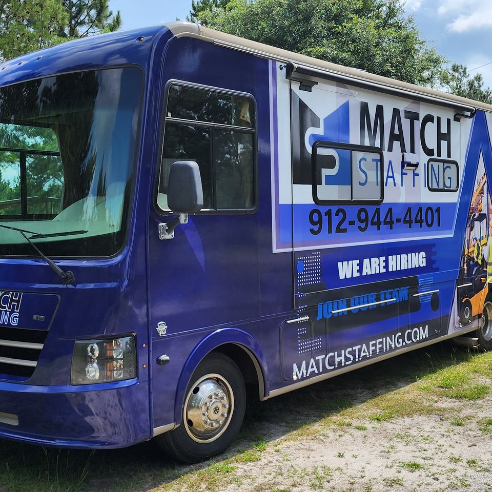 Blue Match Staffing wrap on a large commercial vehicle